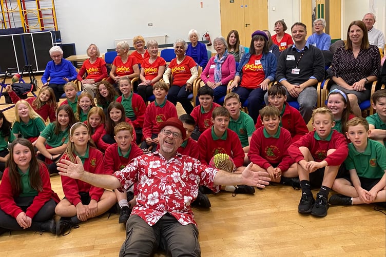 Children from Rhiwbeina Primary School with their visitors from the local Goldies Cymru session with Andy Roberts, Goldies session leader, out in front.