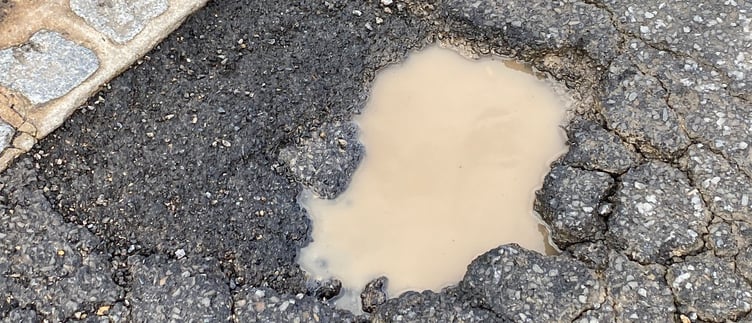 Pothole in Meyrick Street, Pembroke Dock, March 2024