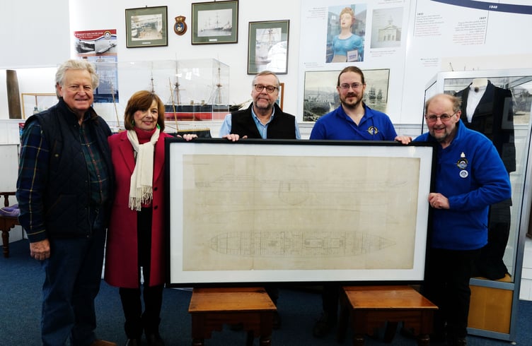 Ian and Christine Jacob hand over the Warrior engraving to Pembroke Dock Heritage Centre team members Trevor Clark, David Howell and John Evans.
PICTURE: Martin Cavaney Photography