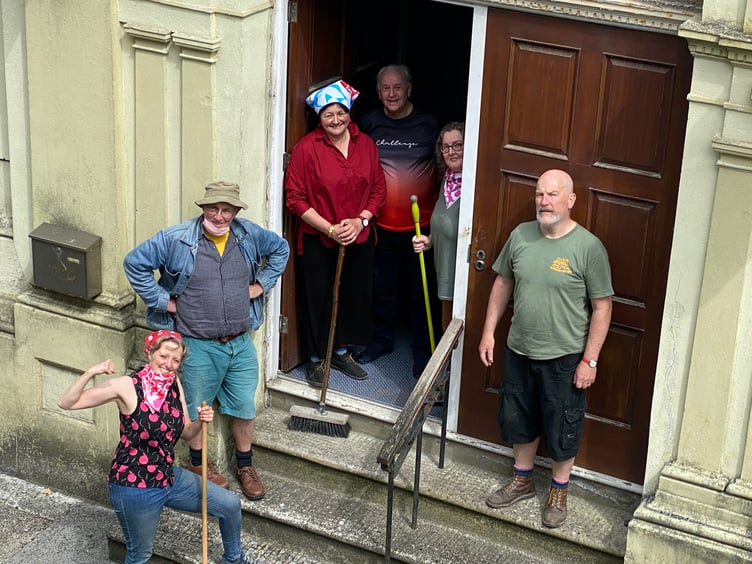 Haverfordwest Printmakers Circle work party prepare to open the hall for a public preview before renovation works begin