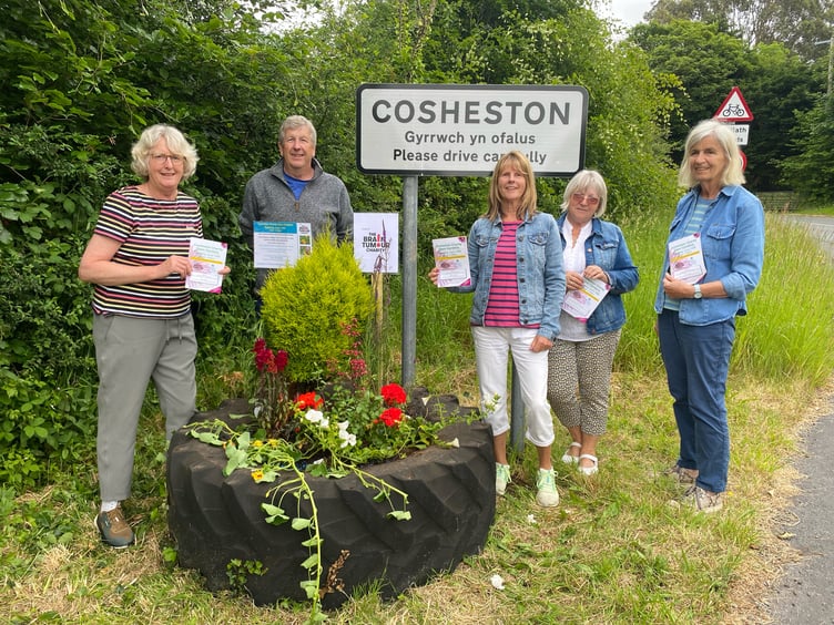 Residents and organiser Jane Mason (left) presented Prue Barlow (right) with a newly printed Cosheston Charity Open Gardens programme.