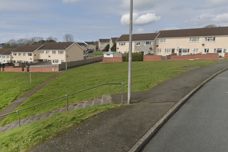 Grass opposite junction between Clare Walk and Devon Drive