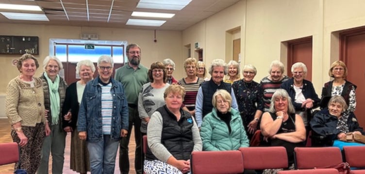 Reporter Patrick Ovenden with WI members at Carew Memorial Hall