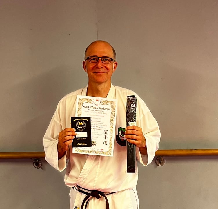 Angle businessman Simon Robson has been successful in grading to Shodan black belt.