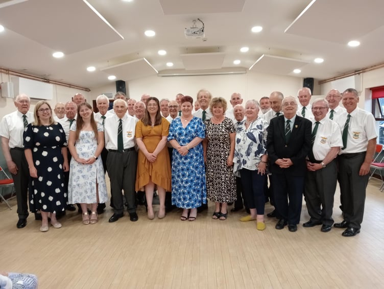 Choristers, soloists, musical teams and Choir President Clive Collins at Lamphey Village Hall.