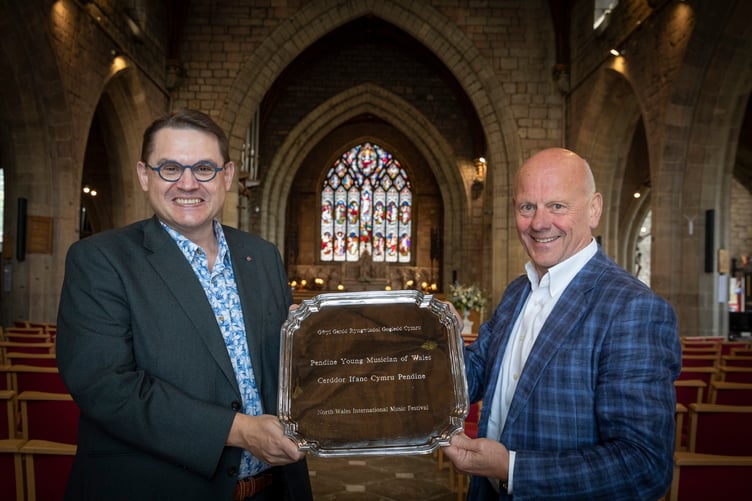 Paul Mealor, Artistic Director of the North Wales International Festival and Mario Kreft MBE, proprietor of Pendine Park with the Pendine young musician of Wales trophy. Photo: Mandy Jones