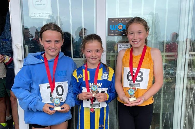 Junior Girls podium winners. (Left to right) Florence harland, Hallie Griffiths, and Emily Baker.