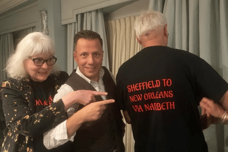 Dale Storr with two fans wearing suitable T-shirts