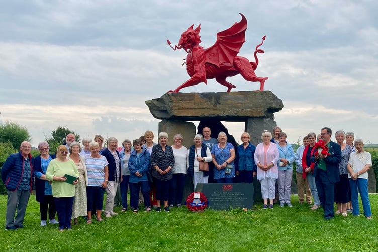 Tenby Travelarts visitors at the memorial in Langemark-Poelkapelle near Ypres, in memory of all those of Welsh descent who took part in the First World War. The memorial was sculpted by Lee Odishow and unveiled on August 16, 2014.