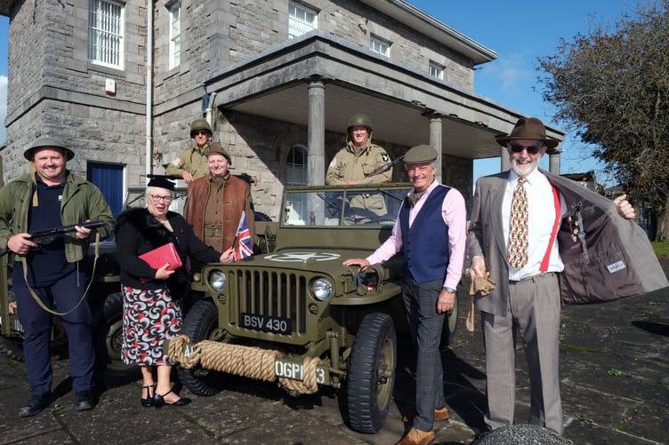 Jeep owners Graham Moss and Dave Slack with Aaron Hosking of Port of Pembroke, Marilyn Mitchell, Andrew Ludlow, Phil Thompson and Peter Mitchell.
