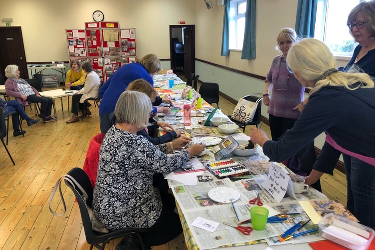 Creating the paper tile montage at Cosheston Village Hall