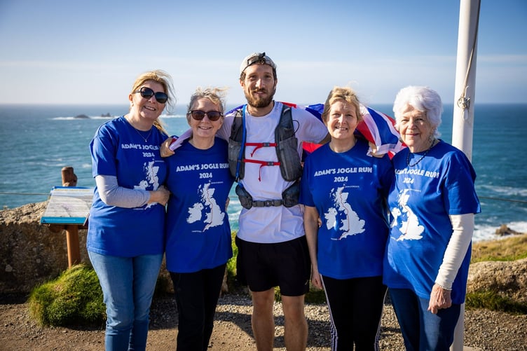 Marathon man Adam Jovic has completed the final leg of his charity challenge from John O’Groats to Lands End in aid of Prostate Cancer UK and Macmillan Cancer Support. He is pictured at the finish with aunt Carole Langston (Begelly), mother Elaine, aunt Jo (also from Begelly) and grandmother Raydene Morgan (Kilgetty).
