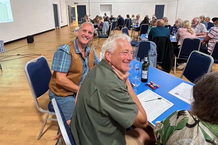 Local residents enjoying an evening of quizzing at the Giraldus Centre, Manorbier