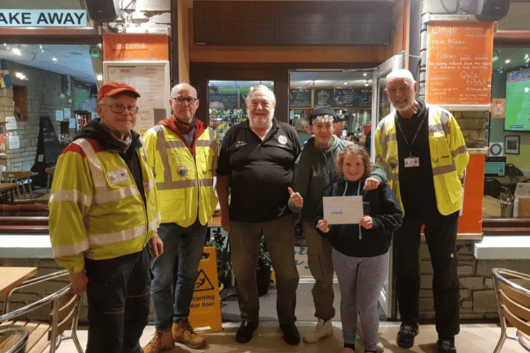 The two female winners Kirsty and Caley are pictured with three members of Blood Bikes Wales and one of the organisers of the Amroth Open Beach Fishing Competition, John O’Connor.
