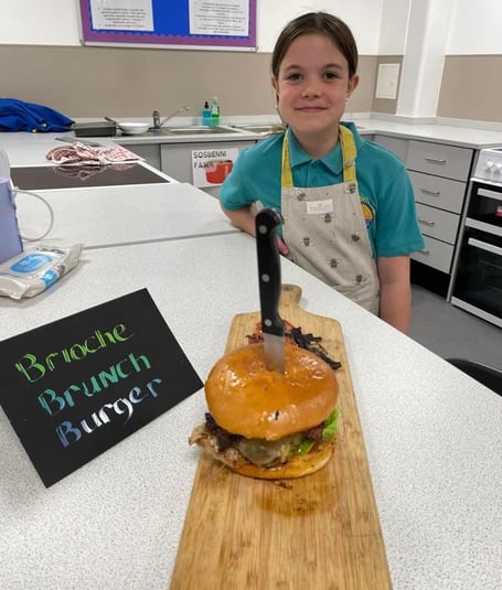 Lottie and her winning Brioche Brunch Burger