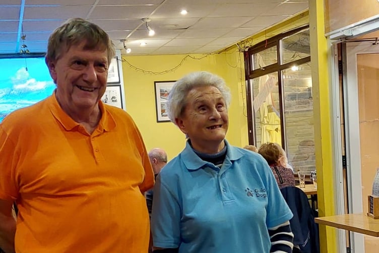 Ian Wilkinson with Eva Rich and guide dog Nancy