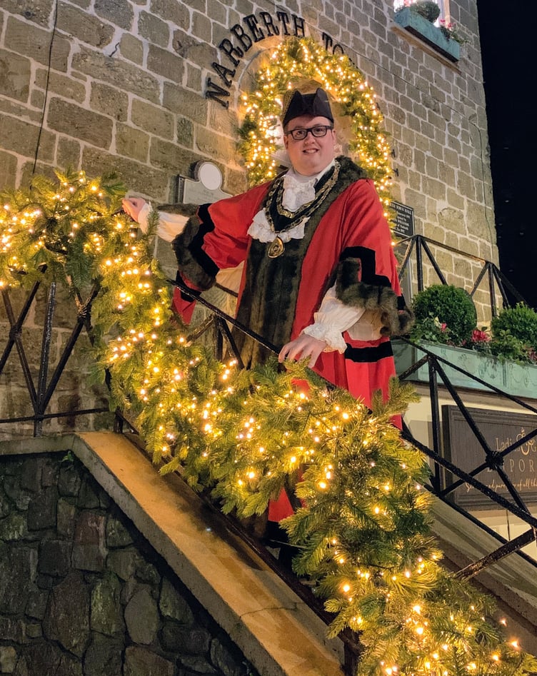 Mayor of Narberth Cllr Chris Walters outside Narberth Town Hall at Christmas time