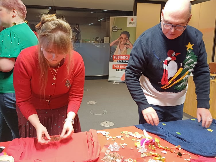 Paul Davies MS for Preseli Pembrokeshire creating jumpers with Delyth Jewell MS for South Wales East.