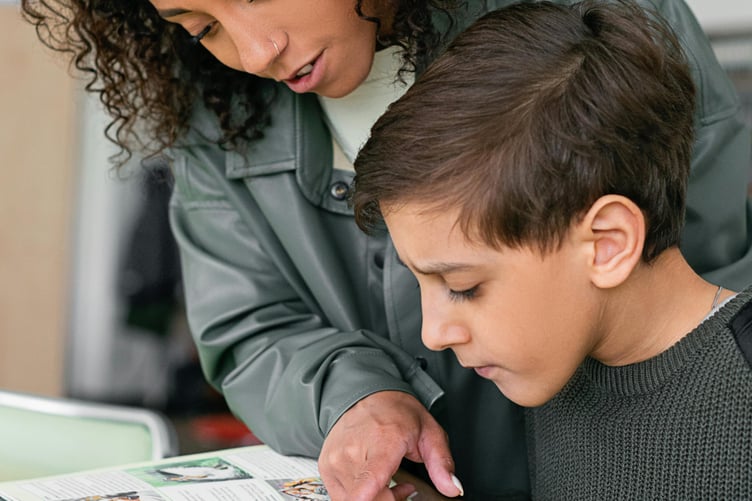 Child reading - stock image