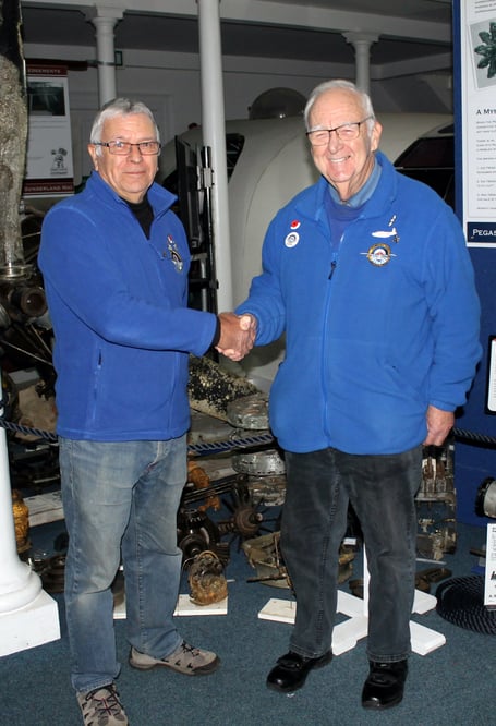 Graham Clarkson (right) congratulates his successor as Chairman of Pembroke Dock Heritage Trust, Rik Saldanha.
