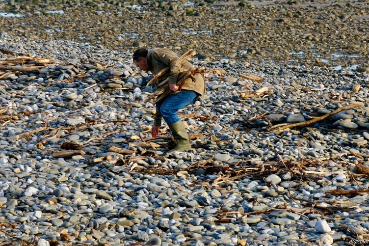 Scene at Amroth in Pembrokeshire where the latest storms have washed away the village beach, leaving a surface of rocks and stones. Photo: Malcolm Richards