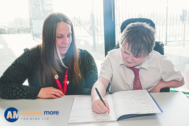 Sarah Stanley with pupil at Ysgol Harri Tudur / Henry Tudor School, Pembroke