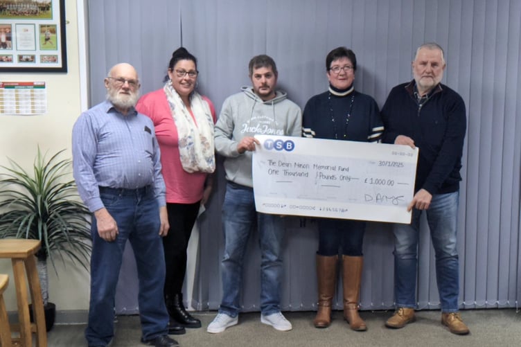 Whitland Classic Motor Club chairman Richard Husband, secretary Xoe Meadows and treasurer David Armytage present the cheque to Gwenfair and Alun Mason. Dean Mason Memorial Fund, Cardiac Risk in the Young (CRY) charity.