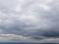 Mild day with partly cloudy skies and light breeze