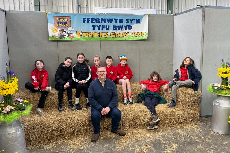 Pembrokeshire Agricultural Society President, Adam Thorne, at the Food Story event with school children from Ysgol Bro Ingli, Newport