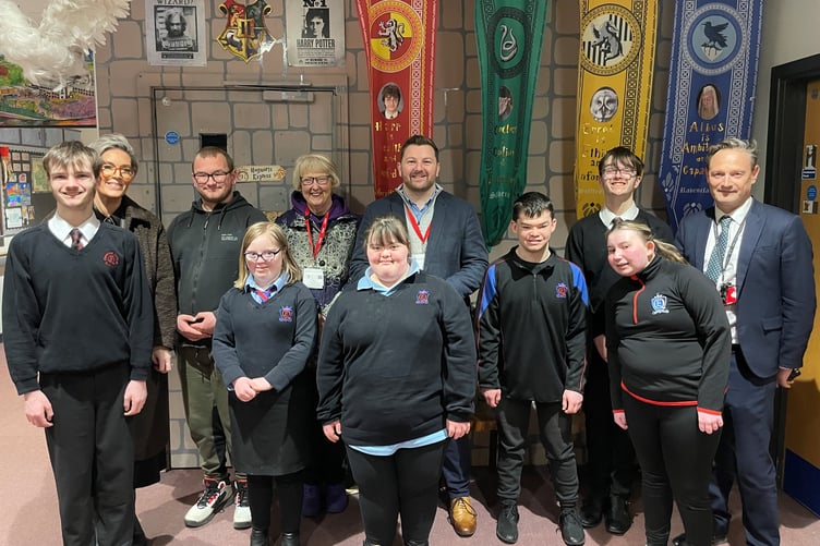 Samuel Kurtz MS, Canolfan leaders Mrs Thomas and Mr Cooke, and Rotary’s Mary Adams with students from the Centre.