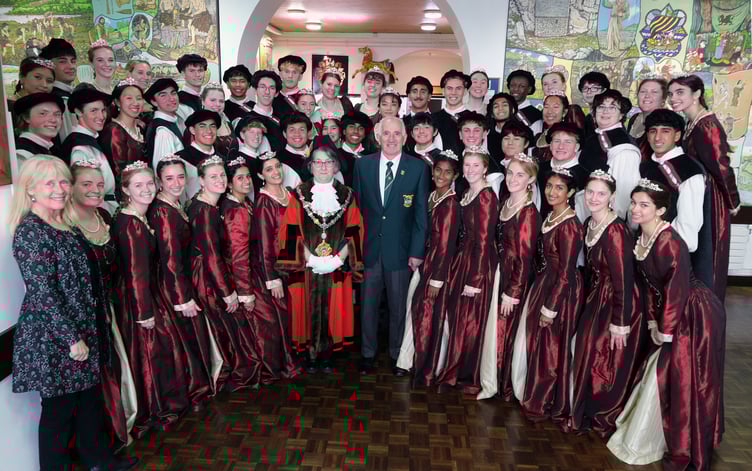 Mayor of Pembroke Cllr Ann Mortensen, and Pembroke and District Male Voice Chairman Huw Morgan, pictured at Pembroke Town Hall with the visiting Mountain View High School Madrigals from California and their musical director, Jill Kenny (left).