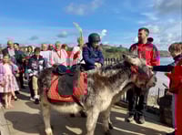 Donkeys lead Palm Sunday Procession in Tenby