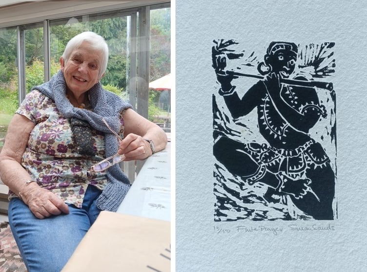 Oriel Q member Susan Sands, alongside one of her linocut artworks: Flute Player
