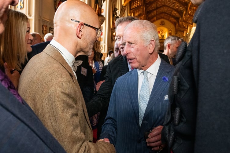 King Charles III congratulates Bluestone National Park Resort’s representative, Marten Lewis, Bluestone’s director of sustainability, at reception for The King’s Awards for Enterprise recipients in Windsor Castle, June 2025.