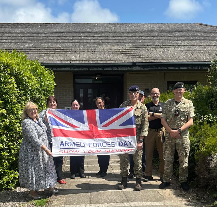 Landmarc and the DIO raising the Armed Forces Day flag at Castlemartin Training Area to celebrate Armed Forces Week 2025.