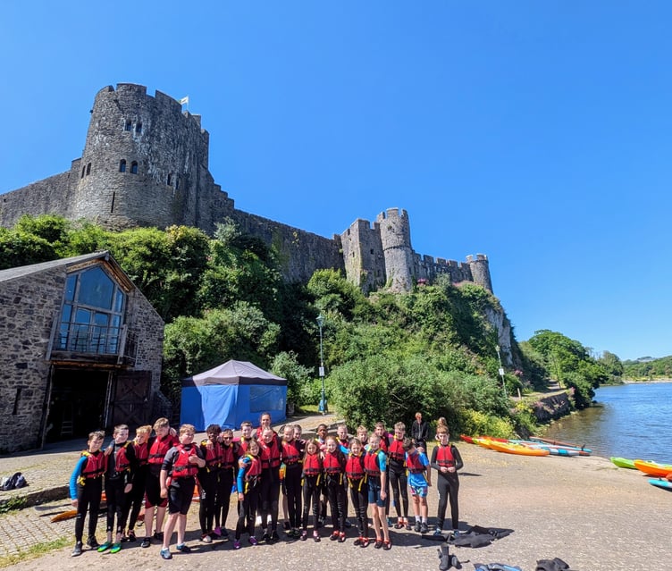 Paddle West students in front of Pembroke Castle