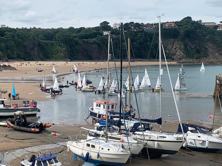 Tired crews coming ashore after three consecutive races at Tenby on August 3