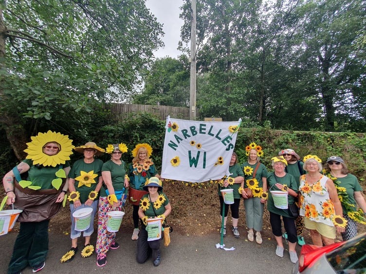 Narbelles WI, pictured in their best sunflower outfits during the Narberth Civic Week Carnival
