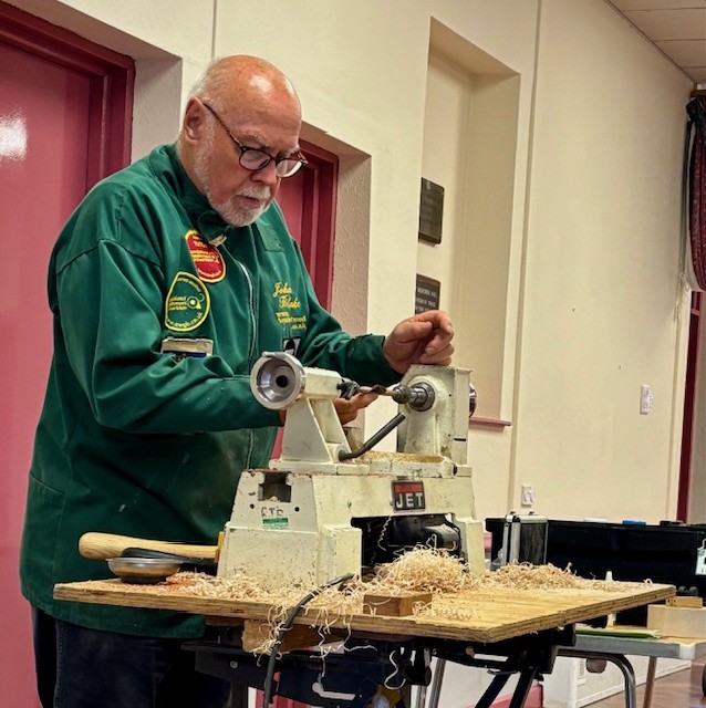 John Blake demonstrating his craft at Carew WI