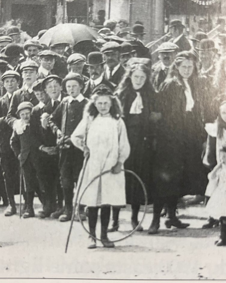A Narberth girl with her hoop in Market Square proudly posing for the camera.
