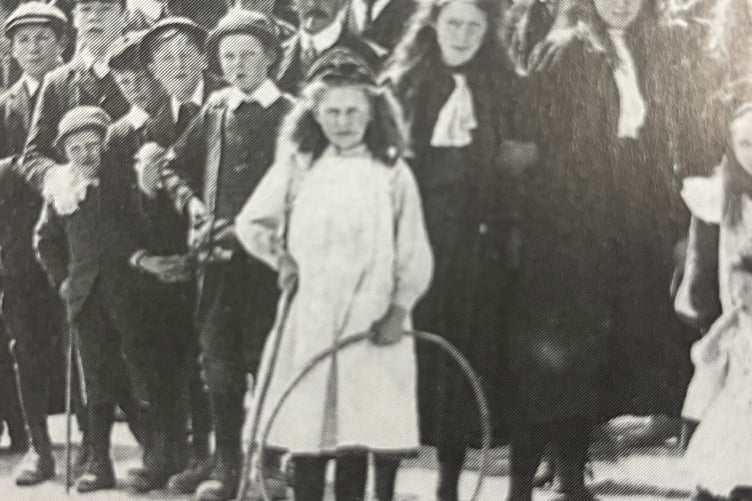 A Narberth girl with her hoop in Market Square proudly posing for the camera.