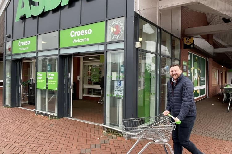 Samuel Kurtz MS outside Asda in Pembroke Dock