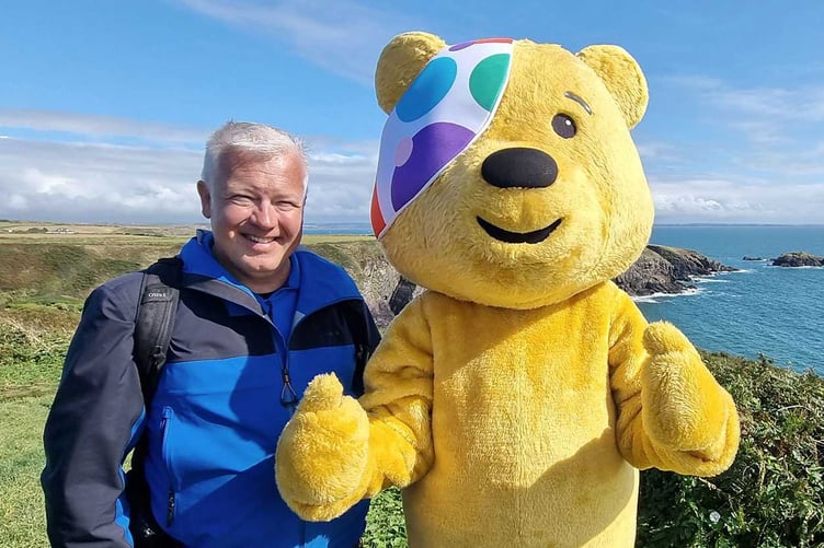 Weather Man Walking for CiN - Derek Brockway