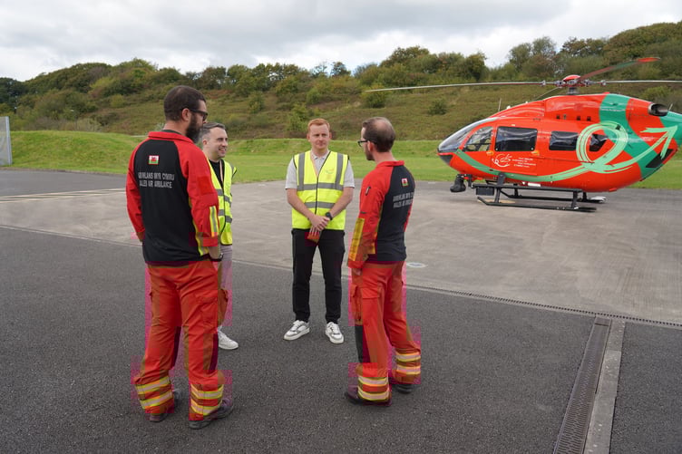 Geoff and James talking with crew members PHeM Dr Matthew Williams and Critical Care Practitioner Matt Jones