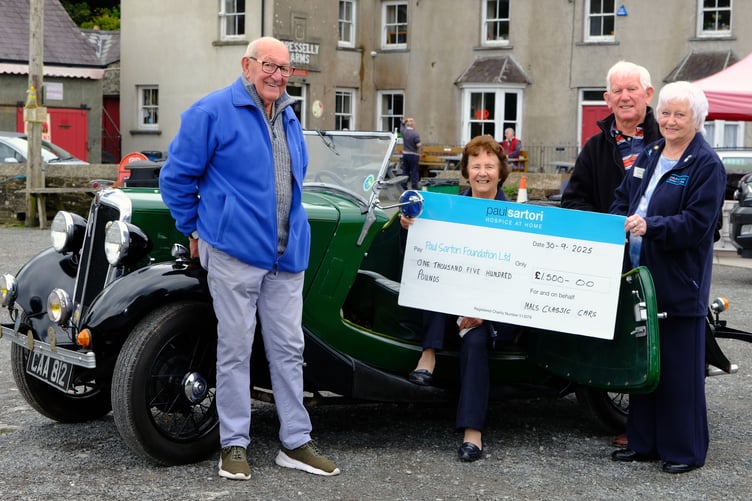Another summer season of Malcolm Powell’s Classic Car Runs in aid of the Paul Sartori Foundation has come to a close. This year, £1,500 has been donated to the Haverfordwest-based Hospice-at-Home charity. Pictured presenting the cheque outside the Cresselly Arms are Malcolm Powell, Mair Evans, Peter Baker and Val Harrold. Photo: Martin Cavaney