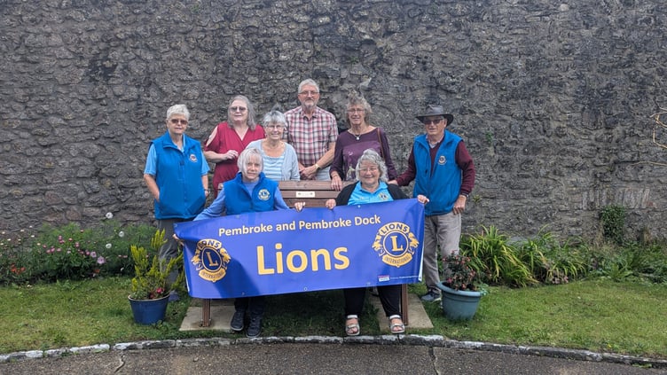 Pembroke and Pembroke Dock Lions with the donated bench