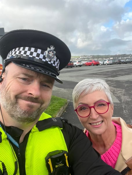 Claire Francis-Boswell with PC Gray at the Fort Road car park