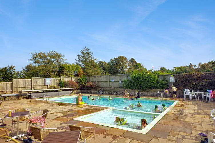 Outdoor solar-heated swimming pool at Tudor Glen