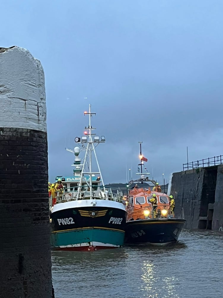 Lifeboat and fishing vessel docked at Milford Haven