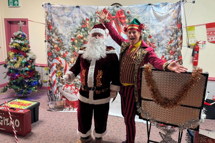 Santa and Gizmo at Carew Memorial Hall